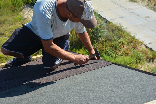 Installing shingles over roof underlayment